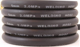 Black welding gas hose showing printed size and pressure markings