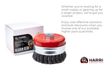 4 inch carbon steel knotted cup brush with retaining ring beside retail box