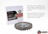 6 inch stainless steel knotted wire wheel with 5/8-11 threaded hub beside retail box