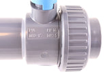 Close-up of 1-inch marking and union nut on gray PVC ball valve