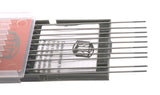 Gray-tip tungsten electrodes extending from open case