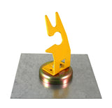 Yellow magnetic TIG torch holder mounted on a steel plate