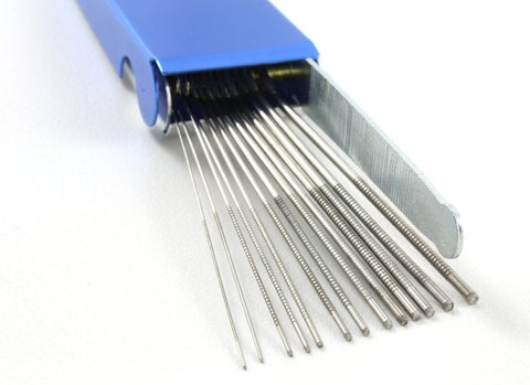 Torch tip cleaner wires extended from blue metal case