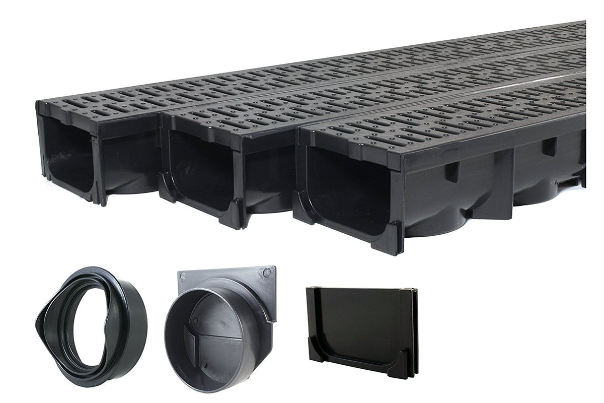 Three black channel drains with grates, end cap and outlet fittings