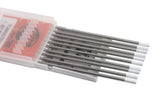 White-tip tungsten rods beside open case